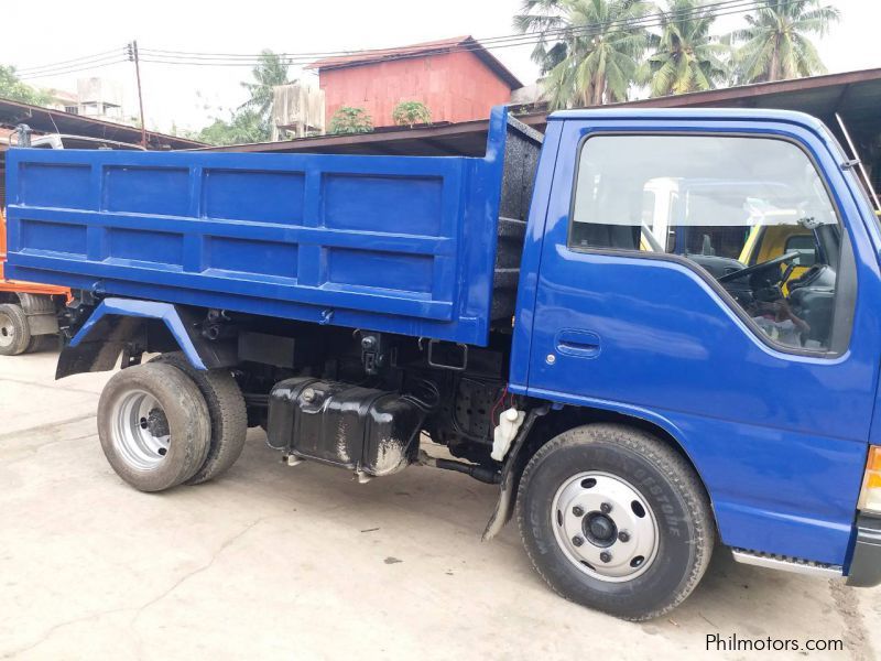 Used Isuzu Elf Mini Dump 4x2 High Deck, High Side Blue 1997 Elf Mini Dump 4x2 High Deck, High