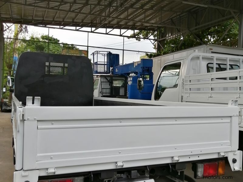 Isuzu NKR with Aircon  ELF Cargo Drop side Truck 14FT 4HF1 in Philippines