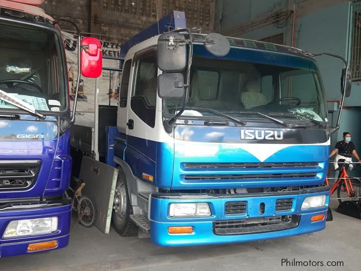 Isuzu Dropside w/ boom crane in Philippines