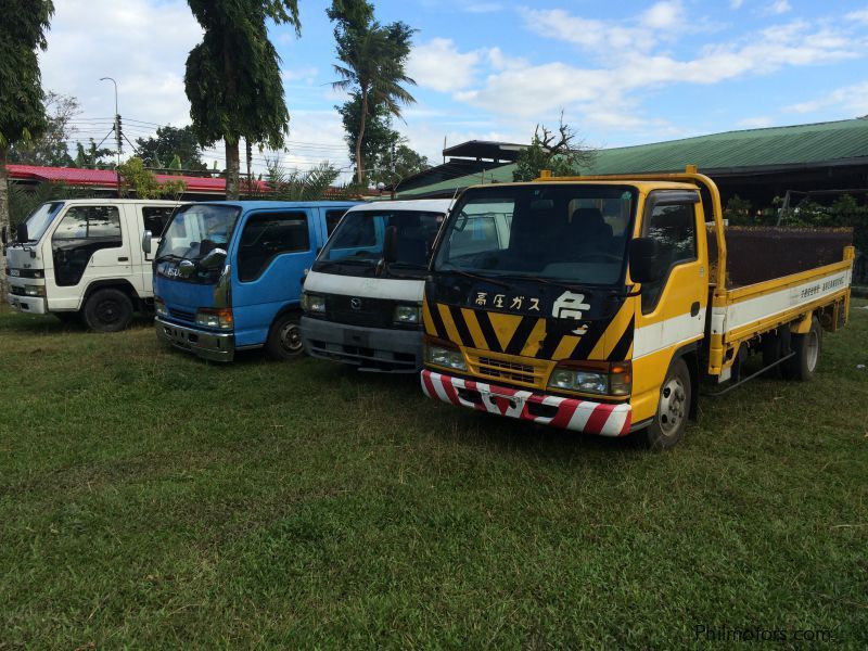 Isuzu ELF 4HF1 NKR 14.7 Dropside with power gate in Philippines