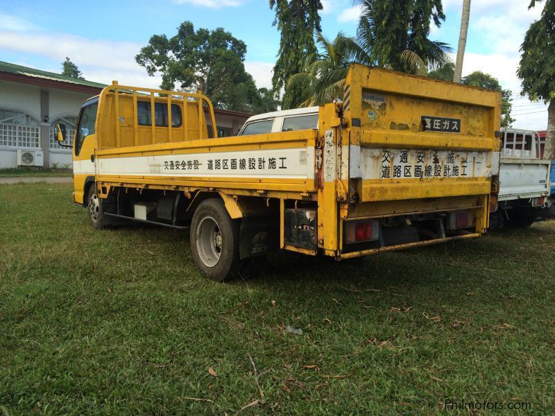 Isuzu ELF 4HF1 NKR 14.7 Dropside with power gate in Philippines