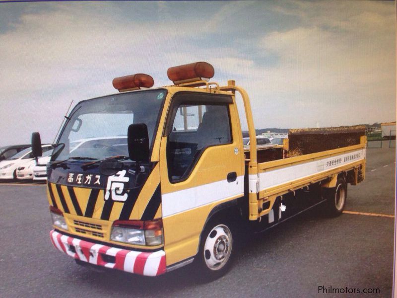 Isuzu ELF 4HF1 NKR 14.7 Dropside with power gate in Philippines