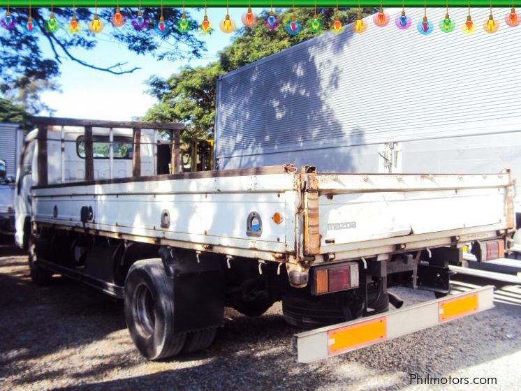 Isuzu Elf Dropside Cargo in Philippines