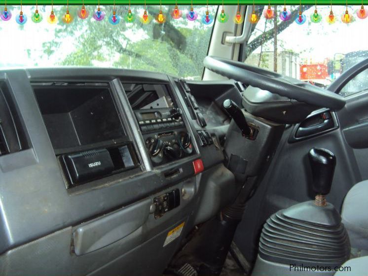 Isuzu Elf Dropside Cargo in Philippines