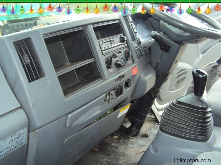 Isuzu Elf Dropside Cargo in Philippines