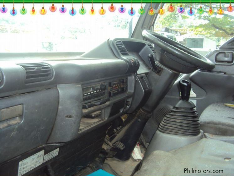 Isuzu Elf Dropside Cargo With Crane in Philippines