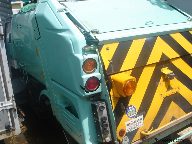 Isuzu ISUZU ELF GARBAGE TRUCK 4HL1 in Philippines