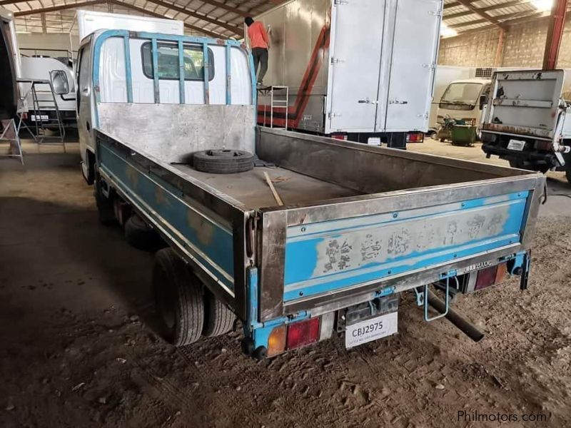 Isuzu Nkr isuzu elf 10ft dropside 4hf1 engine suspension type manual 2019 yr model in Philippines