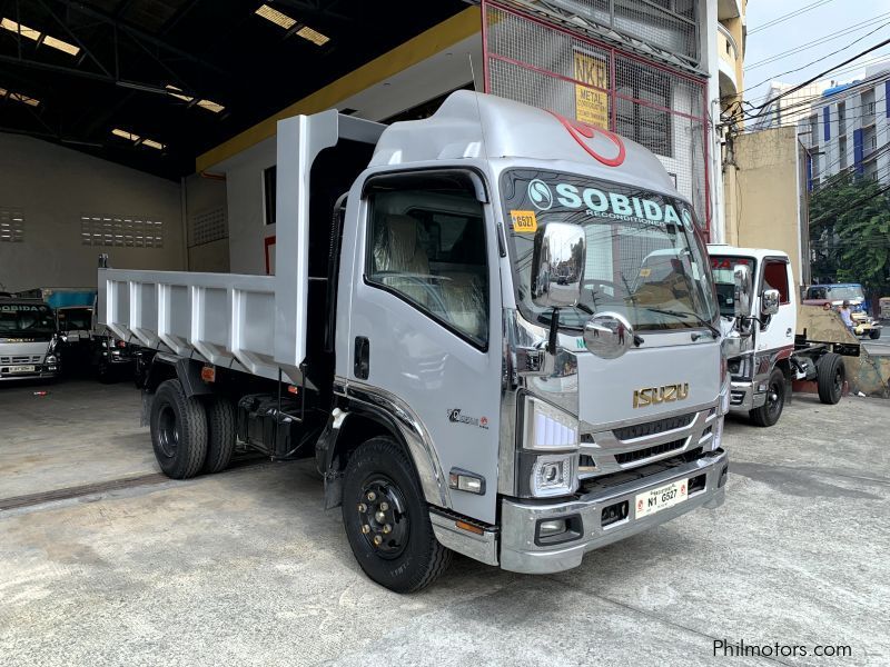 Isuzu elf surplus dump truck (semi high side) reconditioned in Philippines