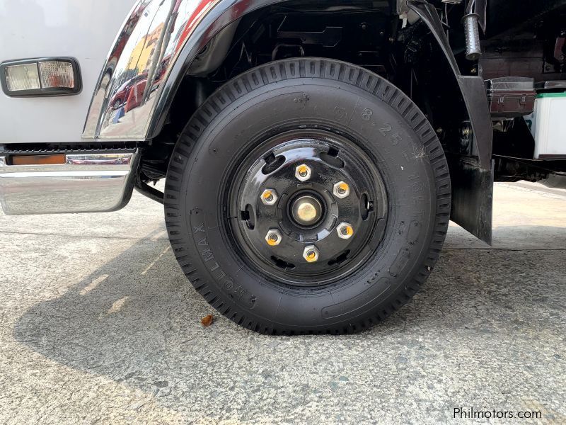 Isuzu elf surplus dump truck (semi high side) reconditioned in Philippines