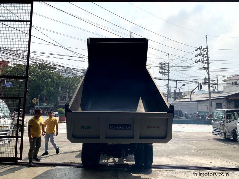 Isuzu elf surplus dump truck (semi high side) reconditioned in Philippines