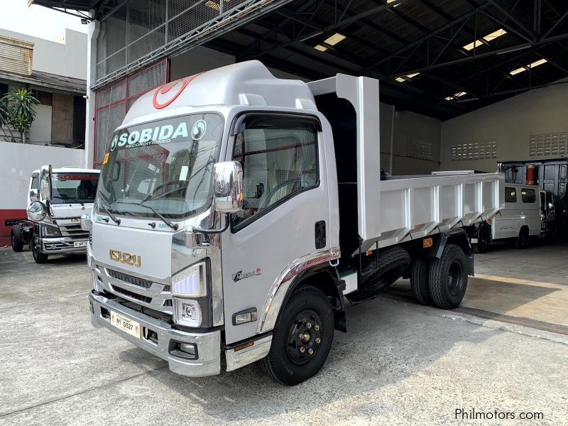 Isuzu elf surplus dump truck (semi high side) reconditioned in Philippines