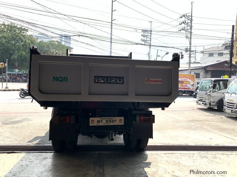 Isuzu elf surplus dump truck (semi high side) reconditioned in Philippines