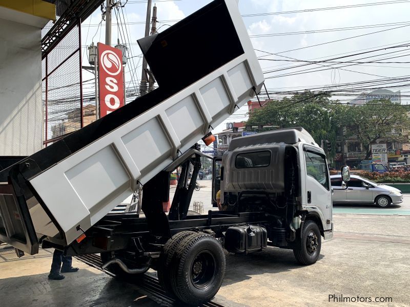 Isuzu elf surplus dump truck (semi high side) reconditioned in Philippines