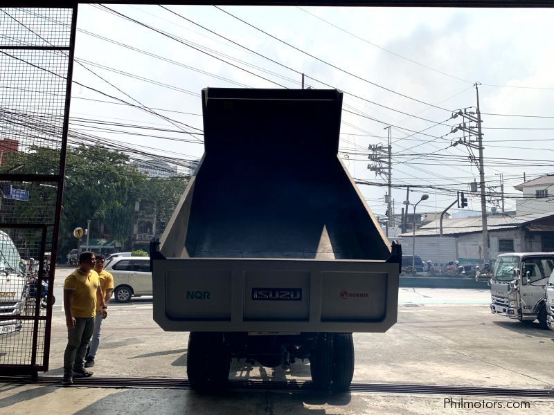 Isuzu elf surplus dump truck (semi high side) reconditioned in Philippines