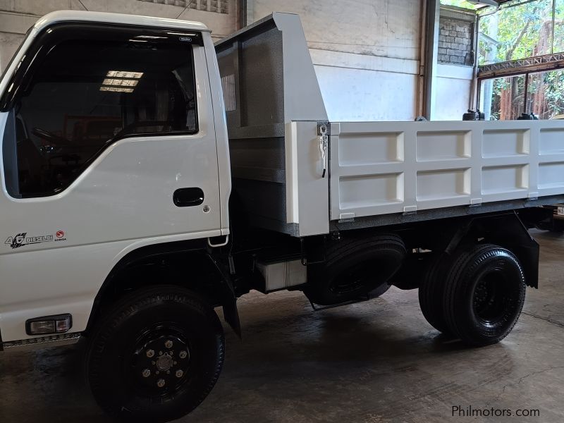 Isuzu elf surplus recontidioned dropside  dump truck nkr  n-series 300 series canter tornado in Philippines