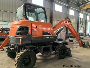 Pre-owned DOOSAN DX60W for sale in 