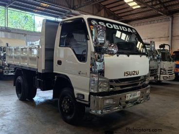 Pre-owned Isuzu elf surplus recontidioned dropside  dump truck nkr  n-series 300 series canter tornado for sale in
