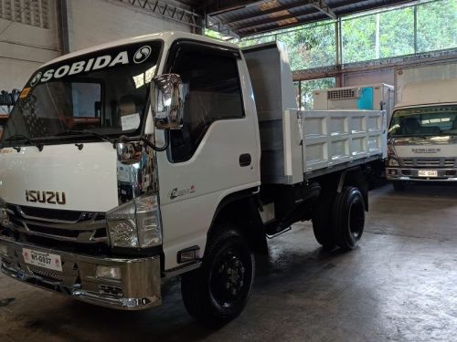 Isuzu elf surplus recontidioned dropside  dump truck nkr  n-series 300 series canter tornado in Philippines