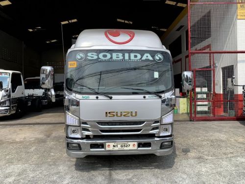 Isuzu elf surplus dump truck (semi high side) reconditioned in Philippines